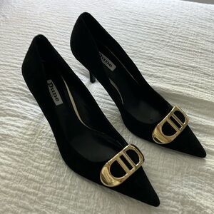 Black suede pumps